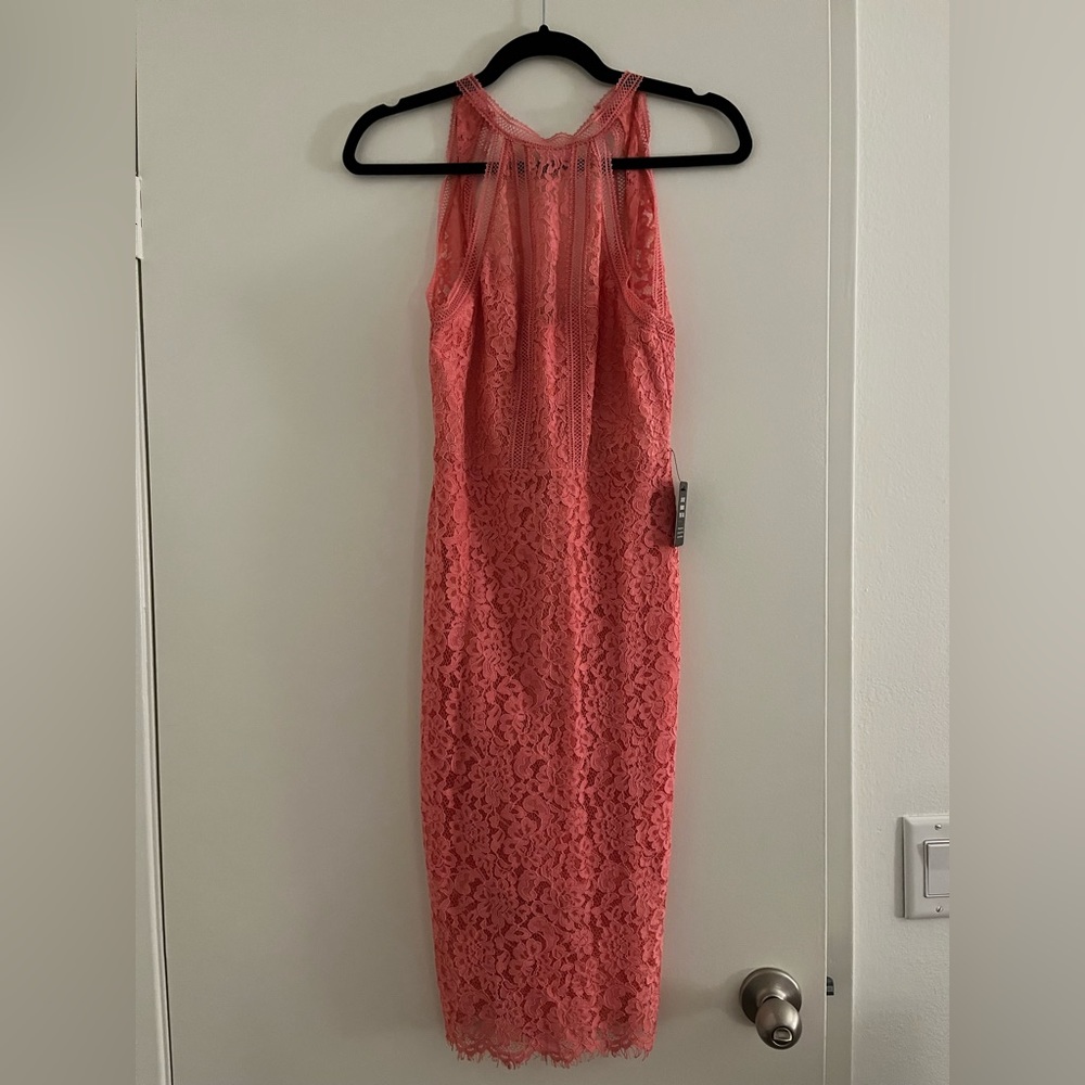 Women’s size 00 pink express dress. New with tags